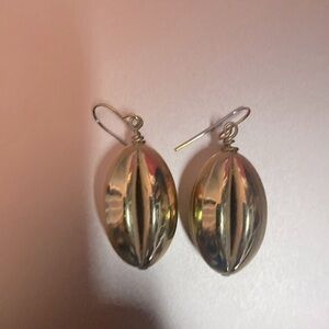 Oval‎ earrings.